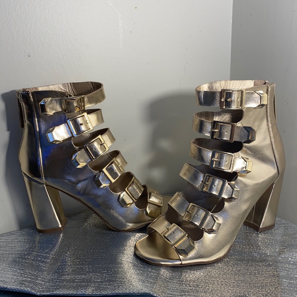 Gold tone gladiator caged shoes